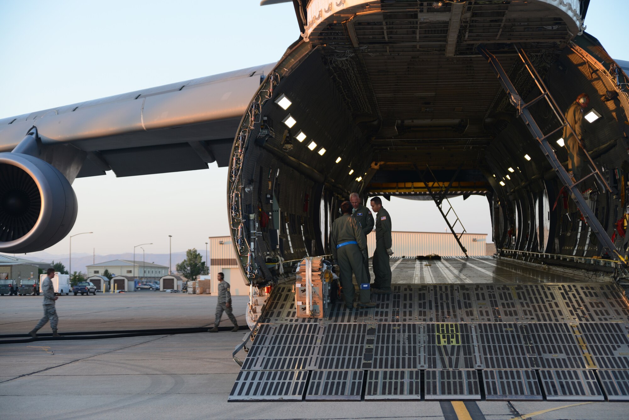 AIrmen from the 709th Airlift Squadron, Dover Air Force Base, Del., and 366th Logistics Readiness Squadron prepare a C-5M Super Galaxy for flight May 28, 2014, at Mountain Home Air Force Base, Idaho. Gunfighters from across multiple groups deployed to Joint Base Pearl Harbor-Hickam, Hawaii, demonstrating continued U.S. commitment to stability in the Asia-Pacific region.(U.S. Air Force photo by Senior Airman Benjamin Sutton/Released)