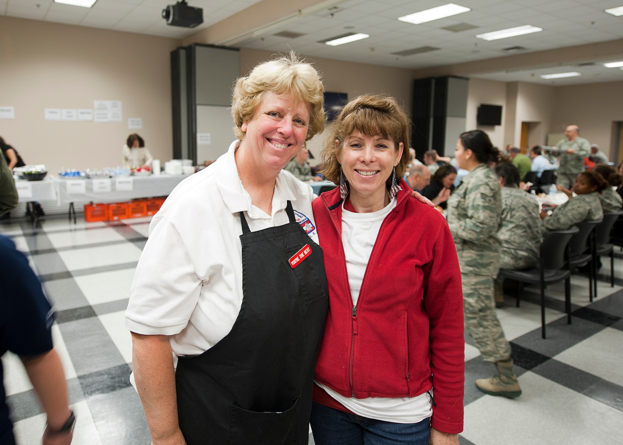 Nancy DeVito, Point Pleasant Elk's Lodge, poses with Col. Cynthia Wong, 514th Mission Support Group commander, during the 2nd Annual Hot Diggity Dog Day luncheon, here May 29. (U.S. Air Force photo/Christian DeLuca). 