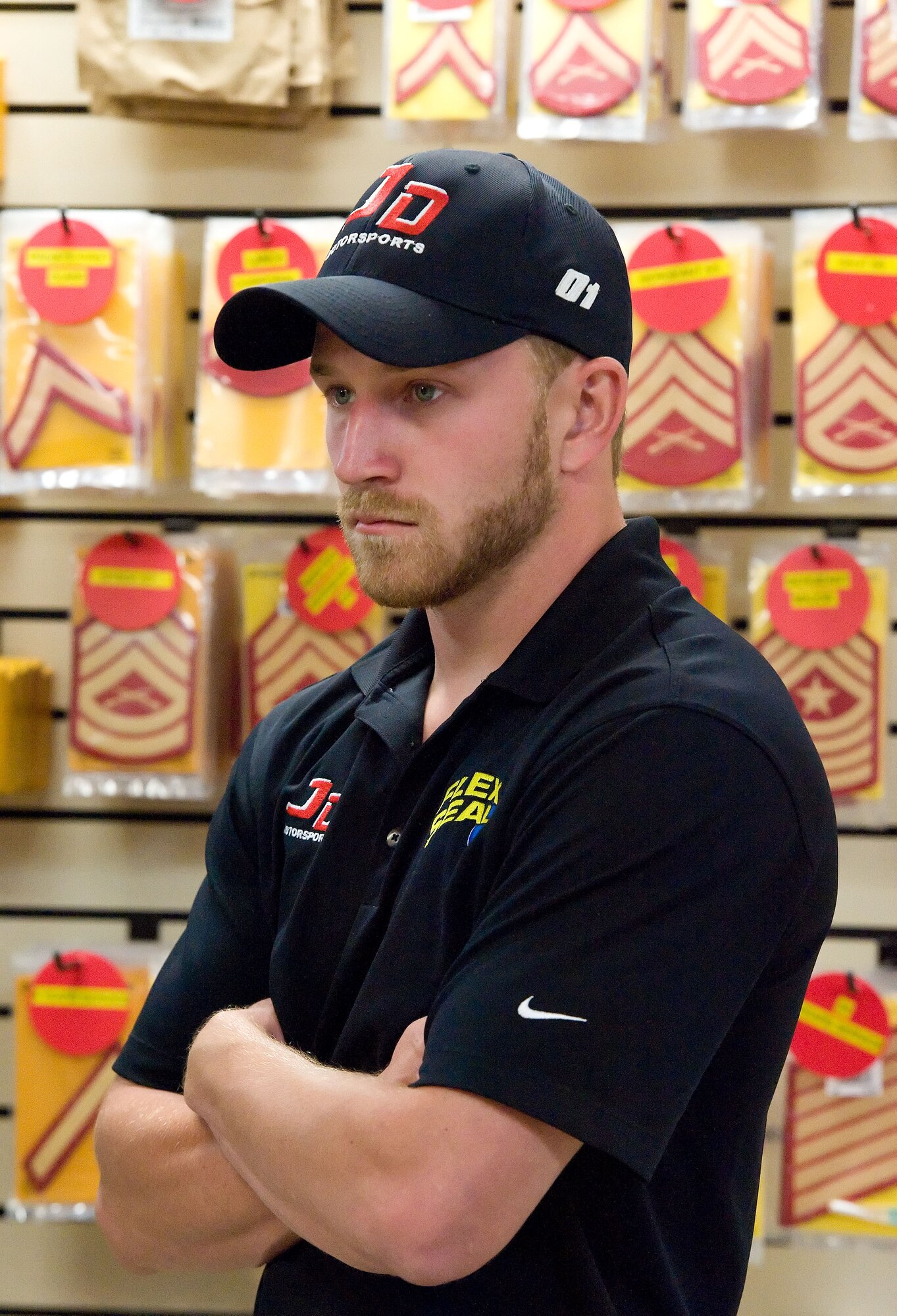 Jeffrey Earnhardt, NASCAR Nationwide Series driver of the JD Motorsports No. 4 Chevrolet Camaro, receives an orientation of Air Force Mortuary Affairs Operations and the Armed Forces Medical Examiner System, May 28, 2014, at Dover Air Force Base, Del. Earnhardt met with AFMAO and AFMES personnel to learn more about their mission. (U.S. Air Force photo/Roland Balik)
