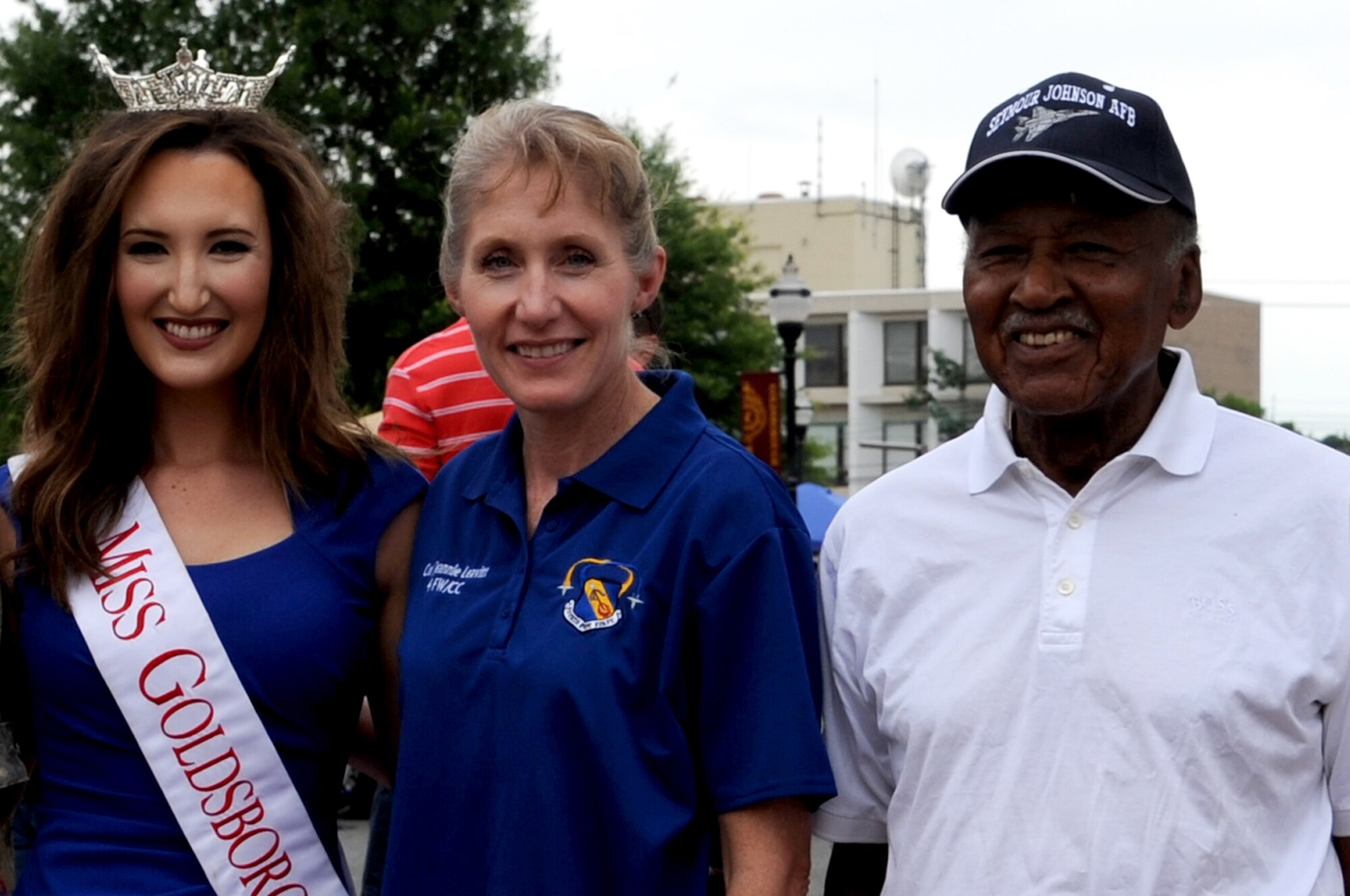 From left, Emily Tucker, Miss Goldsboro 2014, Col. Jeannie Leavitt, 4th Fighter Wing commander, and Al King, Mayor of Goldsboro, pose, May 29, 2014, after the kick-off of the Center Street Jam in Goldsboro, North Carolina. Center Street Jam is an annual summer music concert held in downtown Goldsboro. (U.S. Air Force photo/Senior Airman Mariah Tolbert)