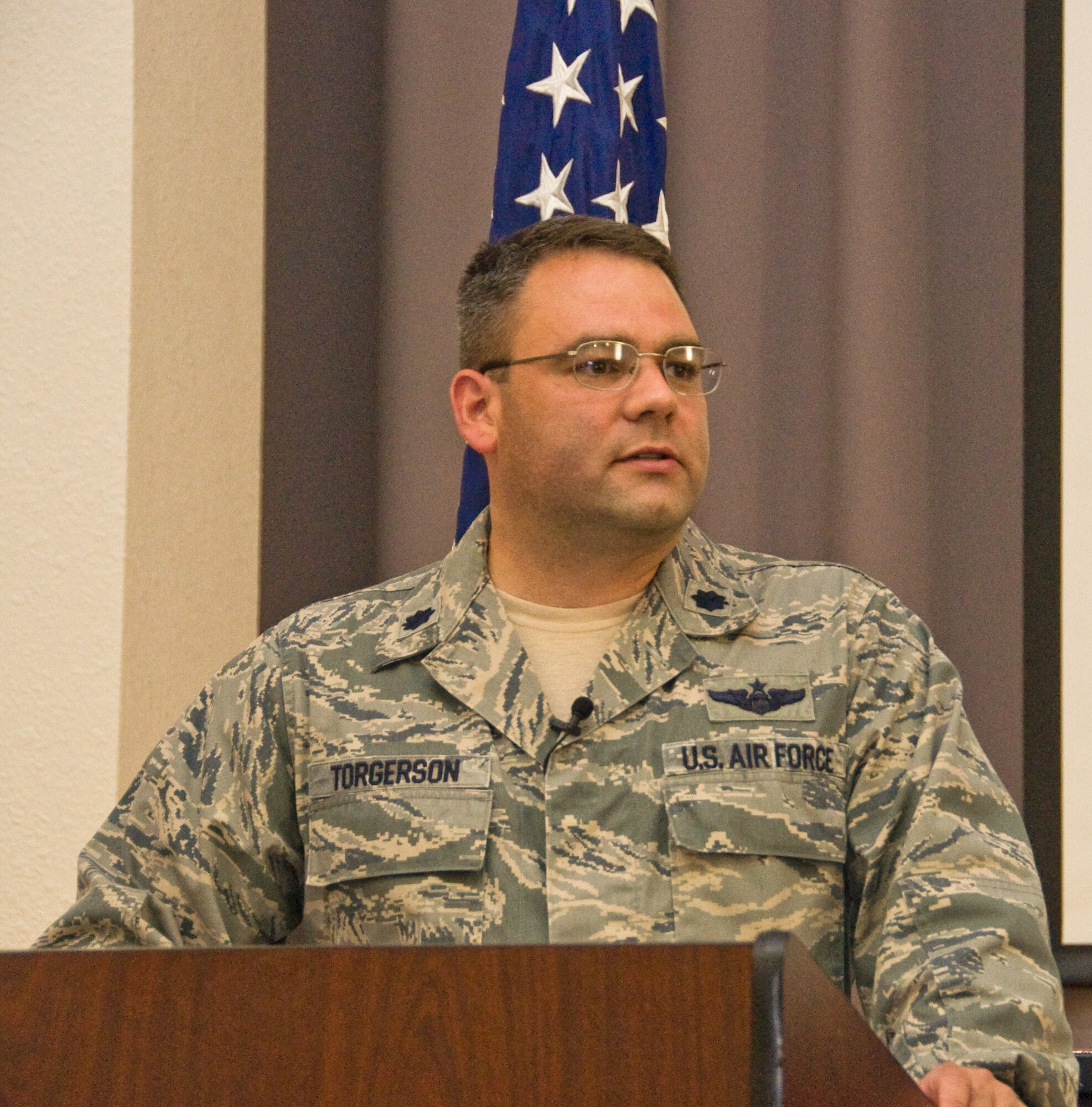 Lt. Col. Jason Torgerson, 60th Air Mobility Wing director of staff, speaks to members of Wing Staff agencies during the Sexual Assault Prevention and Response down day Tuesday in the auditorium of Bldg. 381. (U.S. Air Force photo/Senior Airman Madelyn Brown)