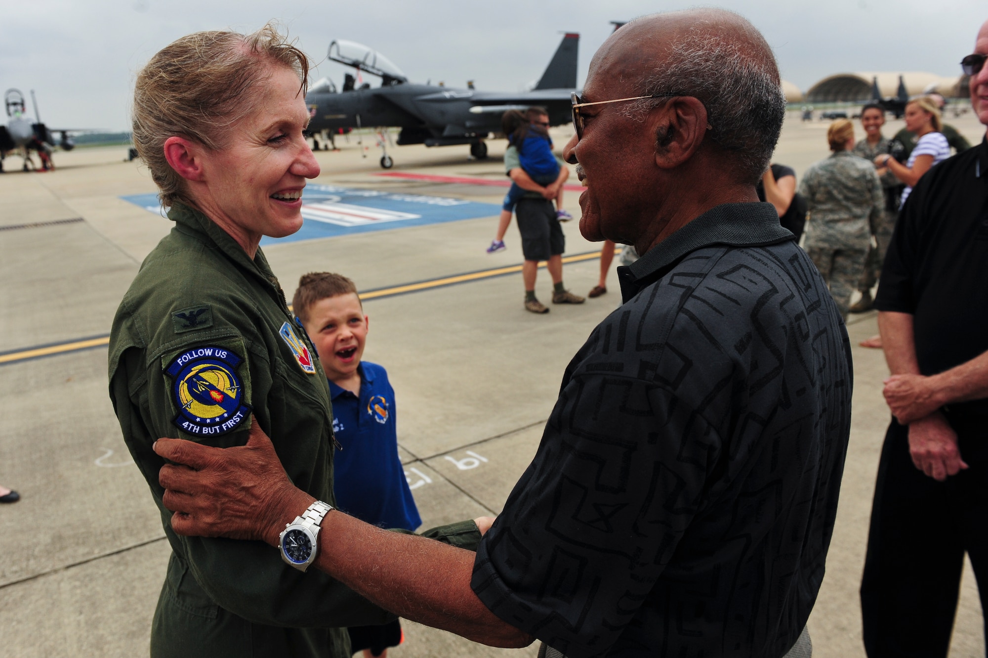 Goldsboro Mayor Al King congratulates Col. Jeannie Leavitt, 4th Fighter Wing commander, following her fini-flight, May 29, 2014, at Seymour Johnson Air Force Base, North Carolina.  Leavitt took control of the 4th FW two years ago, becoming the first female to command an active duty fighter wing.  (U.S. Air Force photo/Airman 1st Class Brittain Crolley)