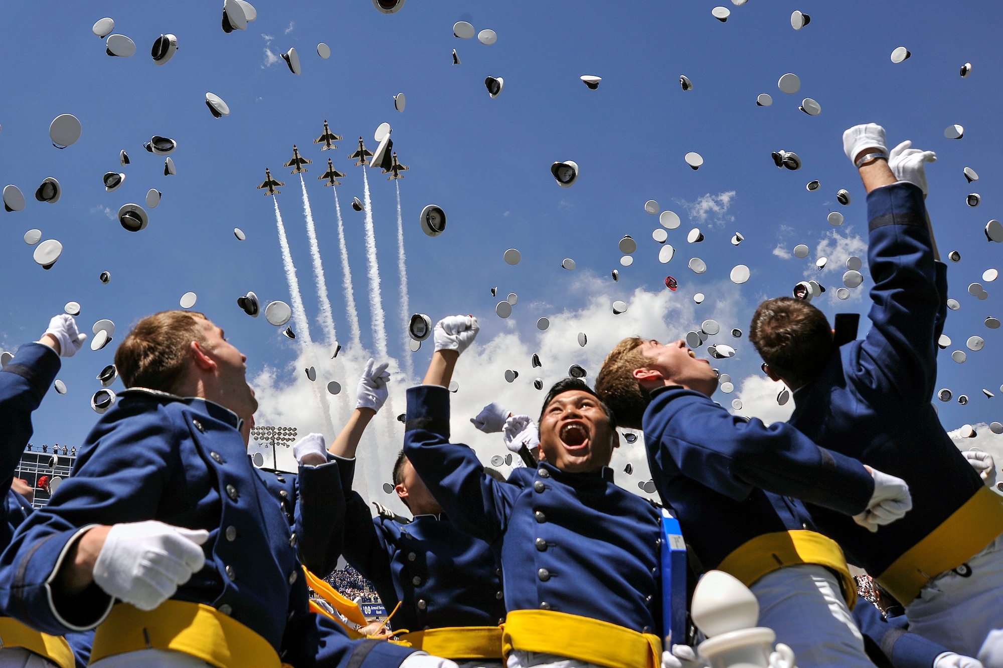 On March 28, 995 cadets graduated from the Academy and received their gold second lieutenant's bars in a ceremony at Falcon Stadium. (Liz Copan/U.S. Air Force photo)