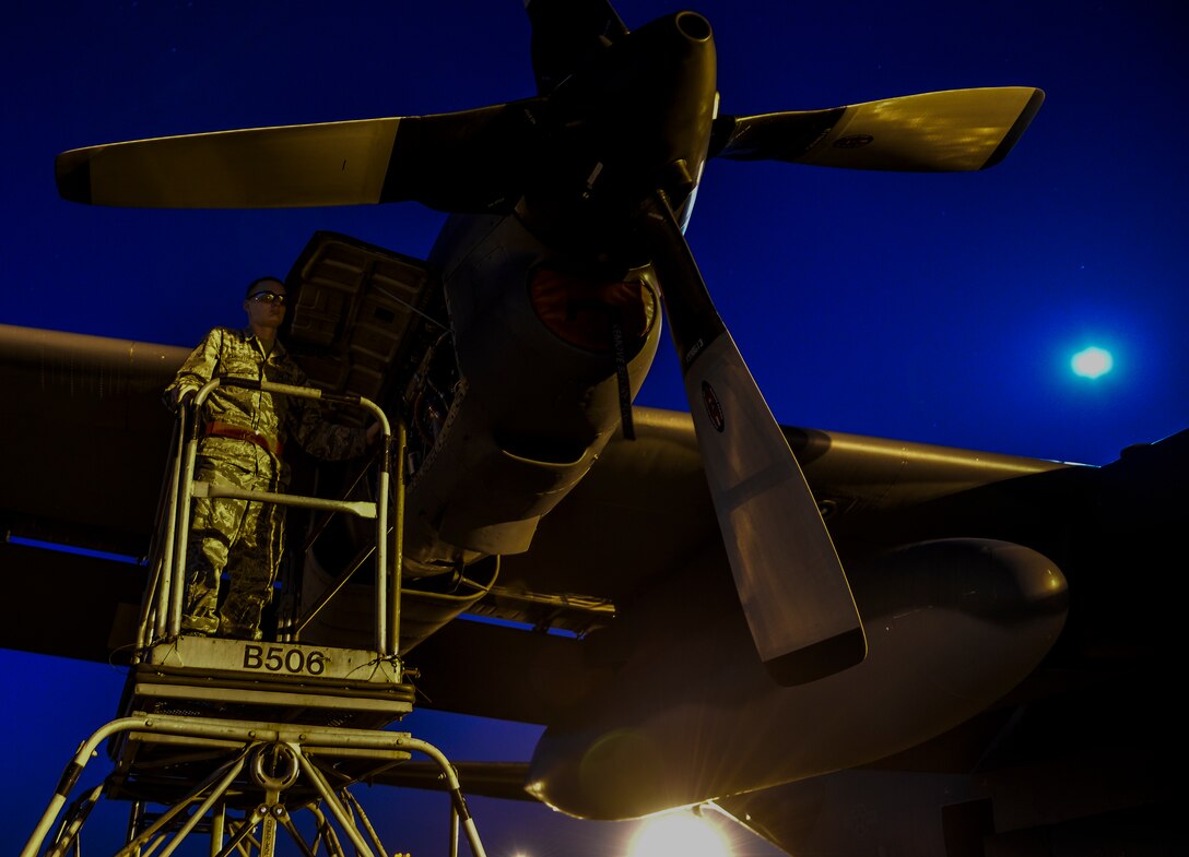 Airman 1st Class Eric Campbell, 4th Aircraft Maintenance Unit aerospace propulsion journeyman, works on an AC-130U Spooky Gunship at Hurlburt Field, Fla., May 16, 2014. The 4th AMU helps generate approximately 1000 training missions annually for the Spooky. (U.S. Air Force photo/Senior Airman Christopher Callaway) 
