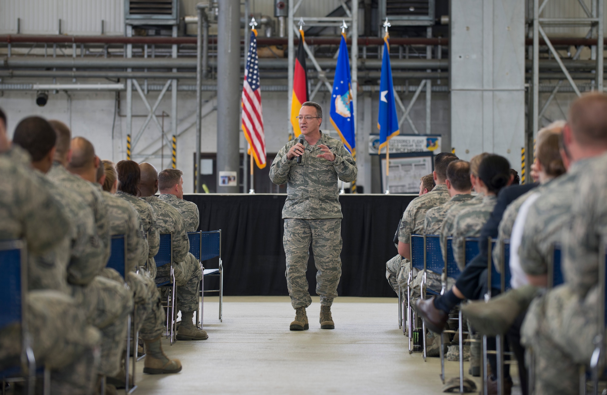 Brig. Gen. Patrick X. Mordente, 86th Airlift Wing commander, speaks at a Sexual Assault Prevention and Response stand-down day, commander’s call on Ramstein Air Base, Germany, May 28, 2014. The stand down day gave units an opportunity to review facts about sexual assault and enhance awareness about behaviors of people that commit the crime. (U.S. Air Force photo/Senior Airman Jonathan Stefanko)