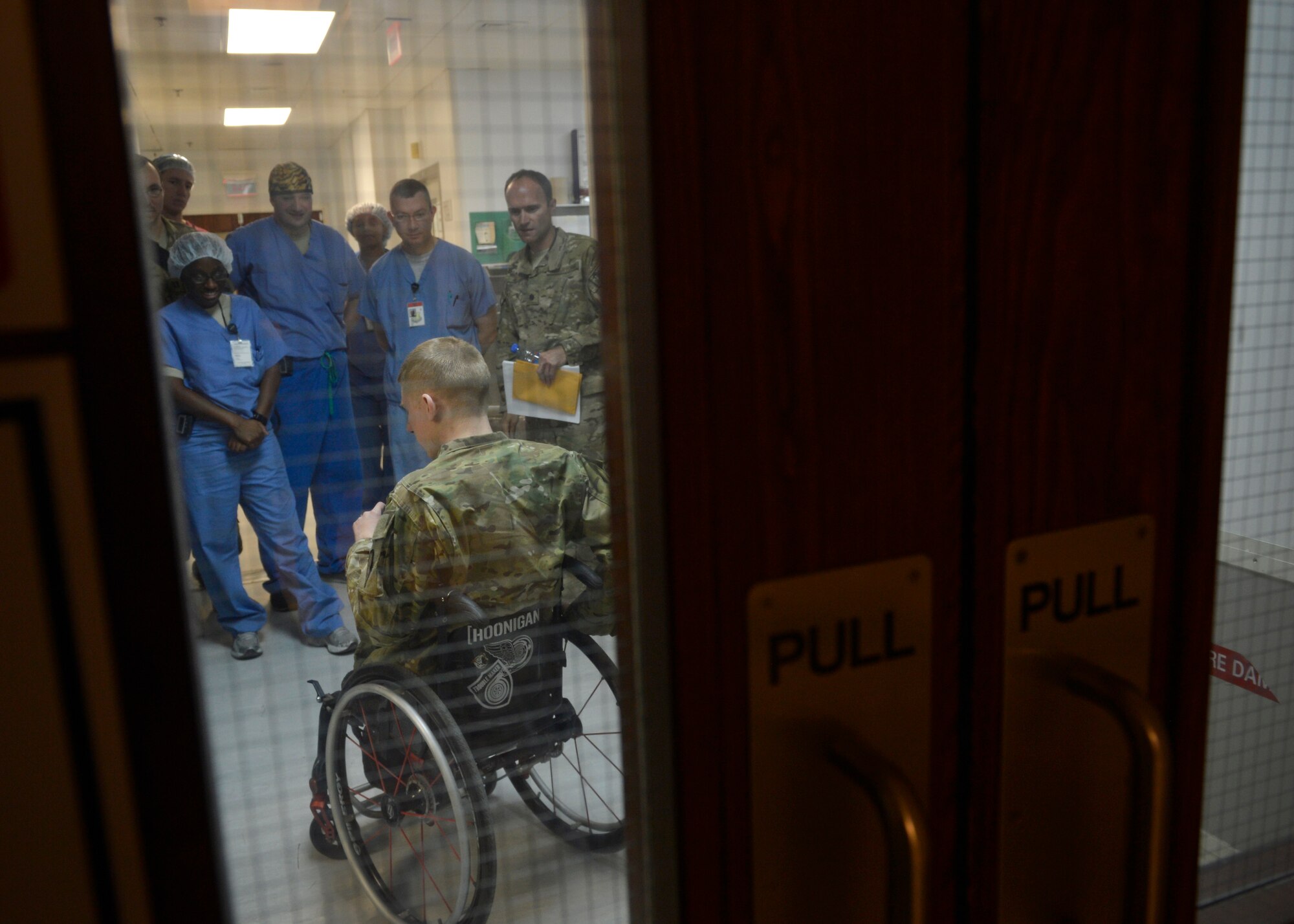 U.S. Army Sgt. Brendan Marrocco, visits Craig Joint Theater Hospital medical staff during Operation Proper Exit at Bagram Airfield, Afghanistan May 28, 2014.  The program is intended to gain a sense of pride and closure for soldiers severely injured in the line of duty. Marrocco talked about his experience and injuries while deployed.  Marrocco is currently retired and a native of Staten Island, New York. (U.S. Air Force photo by Staff Sgt. Evelyn Chavez/Released)