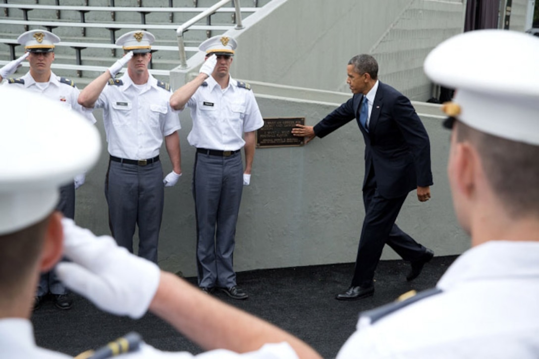 President Barack Obama touches the Marshall Plaque at Michie Stadium ...