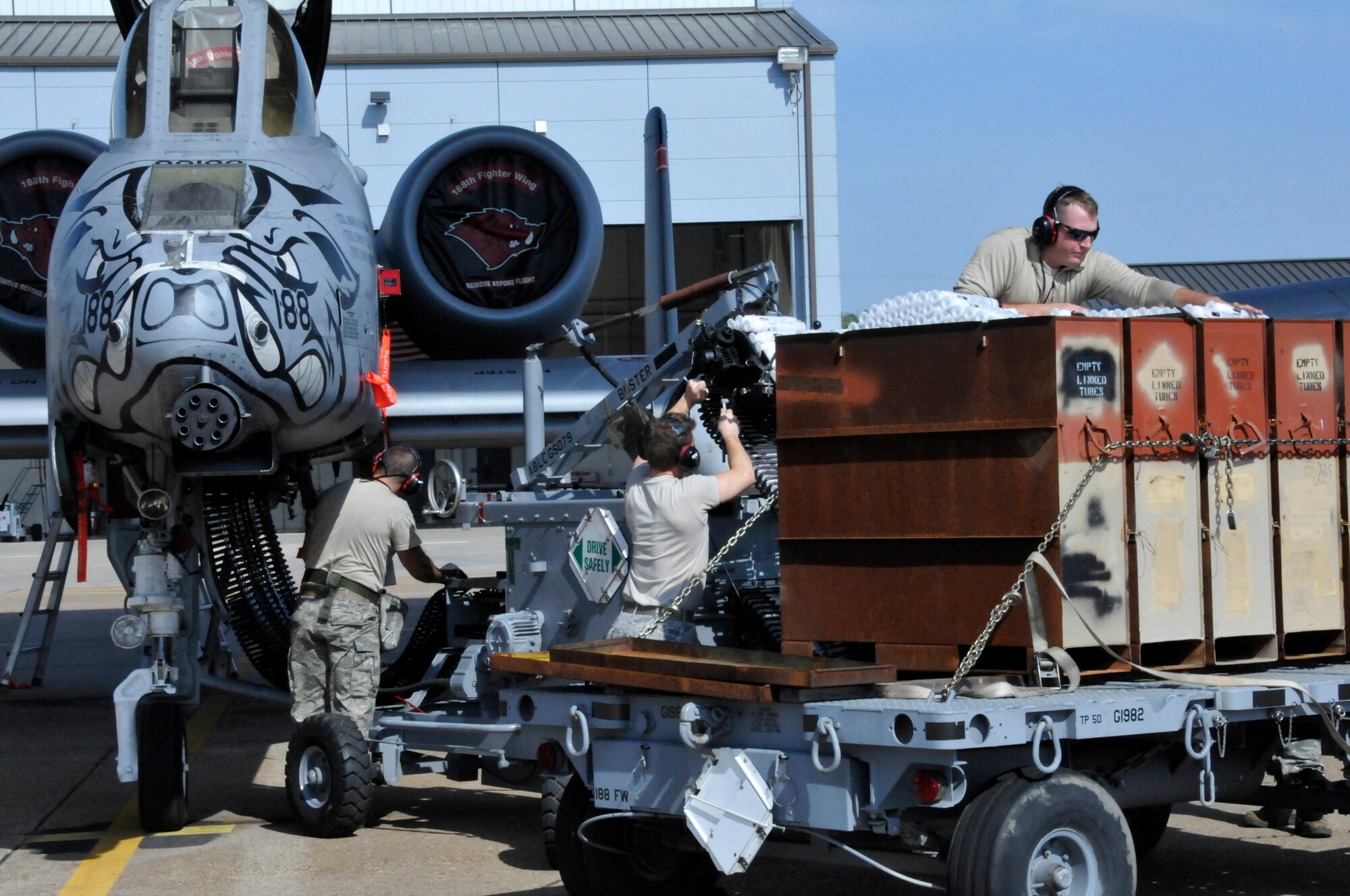 Airmen from the 188th Aircraft Maintenance Squadron’s Weapons Element conduct the last 30mm Gatling gun download on an A-10C Thunderbolt II “Warthog” aircraft at Ebbing Air National Guard Base, Fort Smith, Arkansas, May 19, 2014. The unit is currently converting from a fighter mission to a remotely piloted aircraft, intelligence, reconnaissance, surveillance and reconnaissance mission. The last two aircraft will leave during the June 7, 2014. (U.S. Air National Guard photo by Tech. Sgt. Josh Lewis/released) 