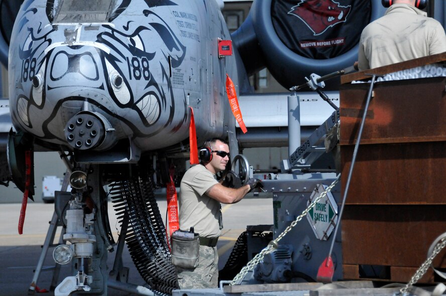 Master Sgt. Travis Black of the 188th Aircraft Maintenance Squadron’s Weapons Element helps conduct the last 30mm Gatling gun download on an A-10C Thunderbolt II “Warthog” aircraft at Ebbing Air National Guard Base, Fort Smith, Arkansas, May 19, 2014. The unit is currently converting from a fighter mission to a remotely piloted aircraft, intelligence, reconnaissance, surveillance and reconnaissance mission. The last two aircraft will leave during the June 7, 2014. (U.S. Air National Guard photo by Tech. Sgt. Josh Lewis/released) 