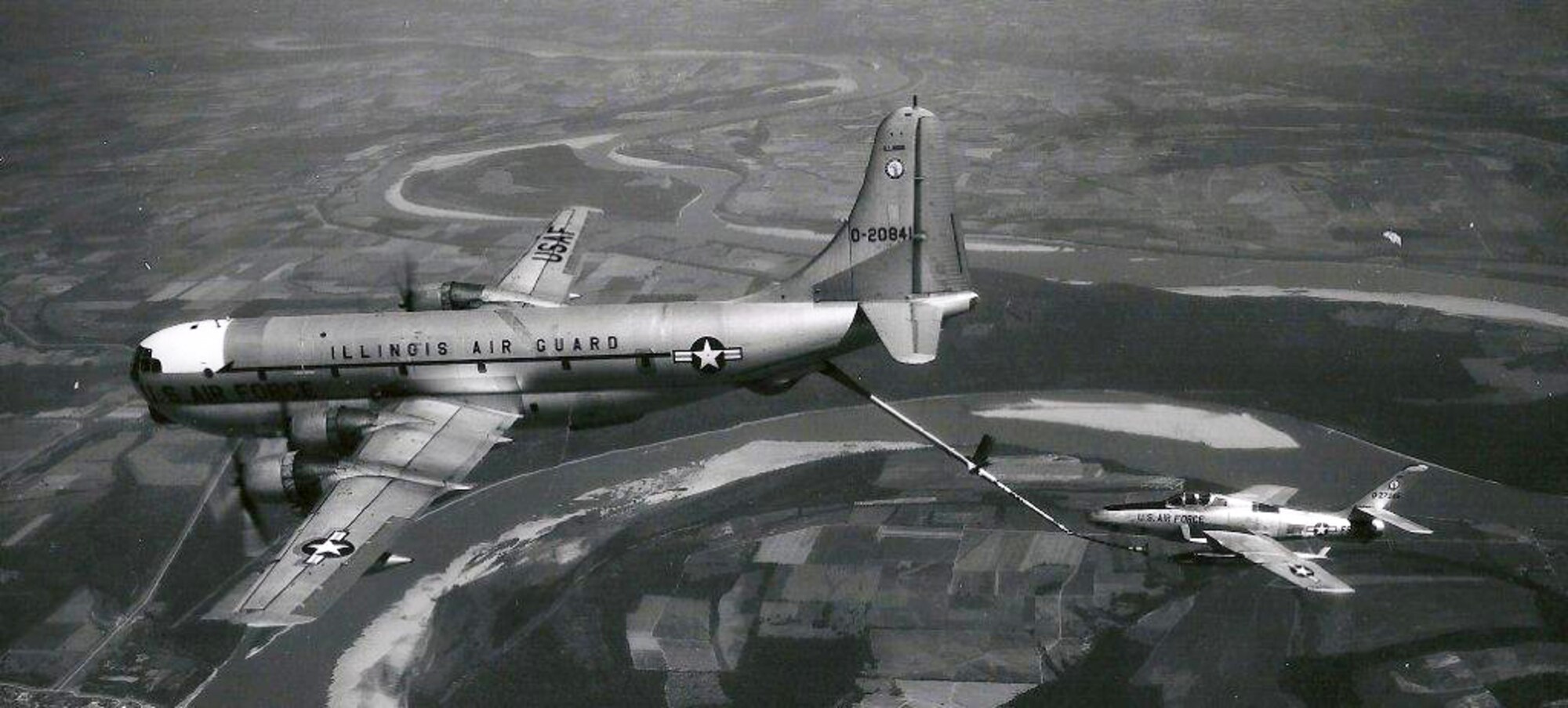 A 126th Air Refuel Wing, Scott Air Force Base, Illinois, KC-97 “Stratotanker”, refuels a 188th Tactical Reconnaissance Group RF-84F. The unit transitioned from the RF-84F to the RF-101C/F “Voodoo” in December 1970. In April 1972, the unit converted again from the RF-101C/F, losing the reconnaissance mission and changing to a fighter mission with the arrival of the F-100D/F “Super Sabre”. The unit change designation from the 188th Tactical Reconnaissance to the 188th Fighter Group. The 188th is currently in transition from a fighter mission back to a reconnaissance-focused mission. (188th Public Affairs/released)