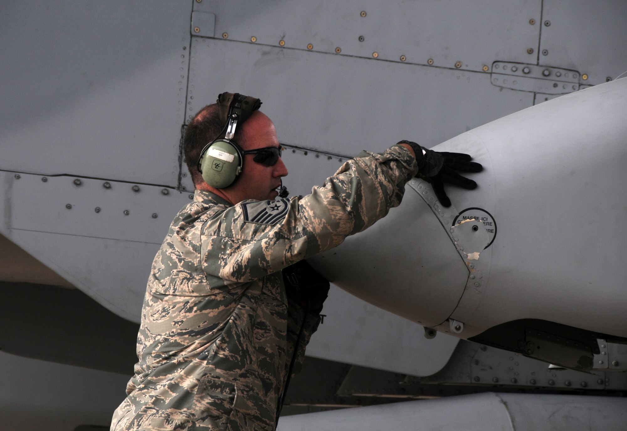 Master Sgt. Haden Key, a crew chief with the 188th Aircraft Maintenance Squadron, prepares an A-10C Thunderbolt II "Warthog" for departure at Ebbing Air National Guard Base, Fort Smith, Arkansas, April 2, 2014. Tail No. 586 was delivered to Moody Air Force Base, Georgia, as part of the 188th Fighter Wing's conversion from A-10s to a remotely piloted aircraft, intelligence and targeting mission. (U.S. Air National Guard photo by Airman 1st Class Cody Martin/Released)