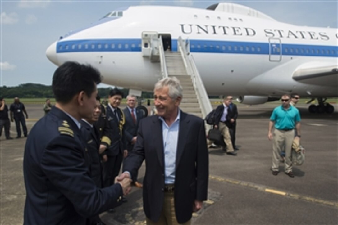 U.S. Defense Secretary Chuck Hagel arrives on Paya Lebar Airfield, Singapore, May 30, 2014. Hagel is on a 12-day trip to Asia and Europe.