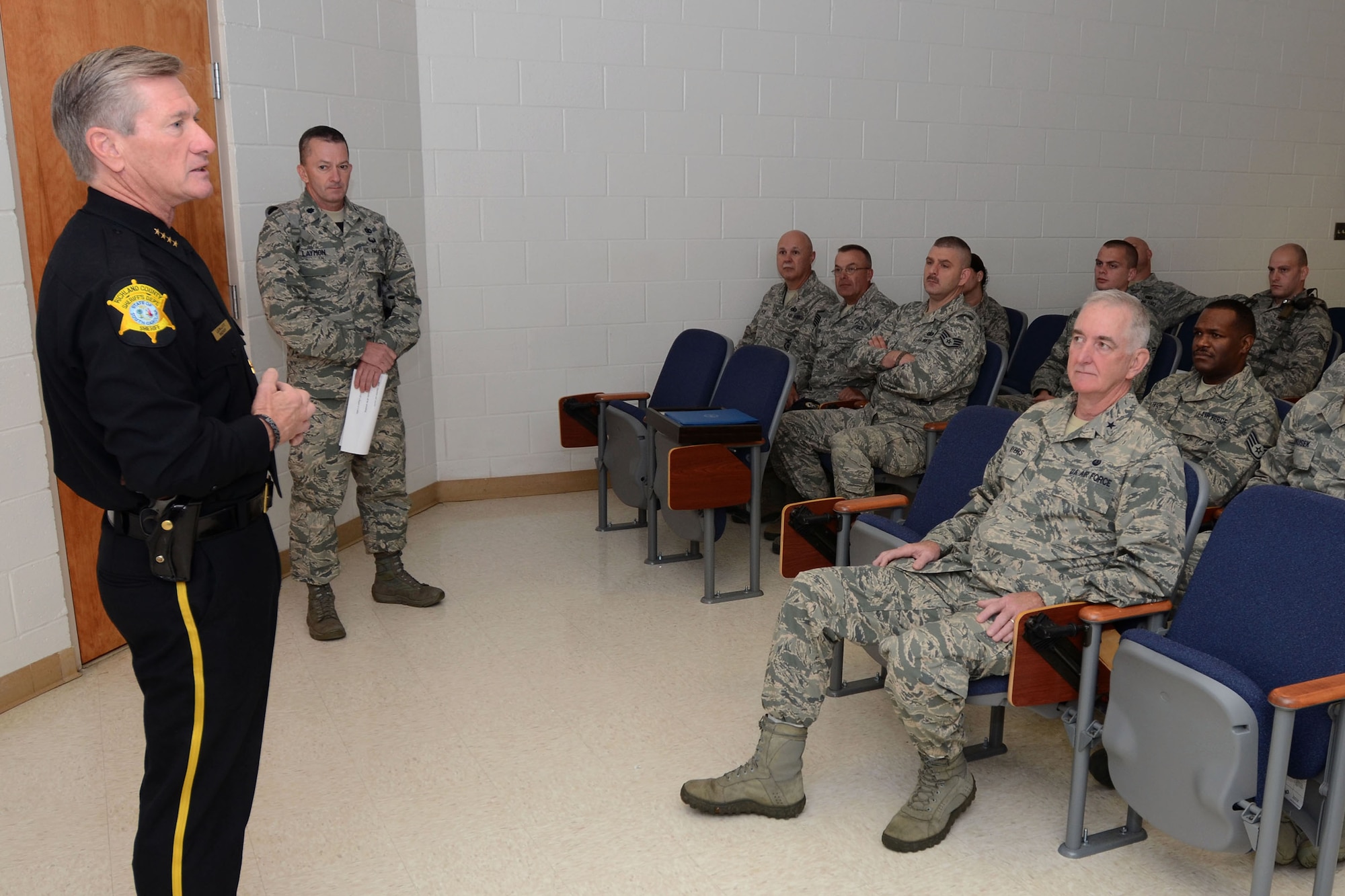 Sheriff Leon Lott, from the Richland County Sheriff's Department, received the title as "Honorary Defense Force Commander" for the South Carolina Air National Guard's 169th Security Forces Squadron during a ceremony held at McEntire Joint National Guard Base, S.C., Nov. 1, 2014. This honor recognized Sheriff Lott as a community leader and supporter of the South Carolina Air National Guard to strengthen community relationships and share in team building training and experience. (U.S. Air National Guard photo by Senior Master Sgt. Edward Snyder/Released)