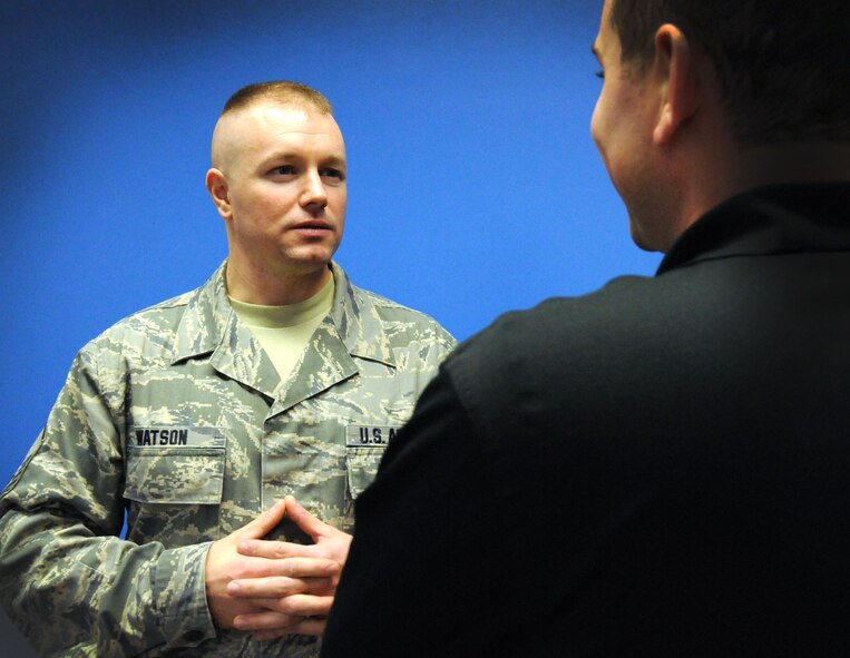 Master Sgt. Kevin Watson, 111th Attack Wing recruiting office supervisor, talks with student flight member Ryan Sweet during drill Nov. 1, 2014, at Horsham Air National Guard Station, Horsham, Pa. Watson earned the fiscal year 2014 award for Recruiting Office Supervisor of the Year. (U.S. Air National Guard photo by Tech. Sgt. Andria J. Allmond/Released)