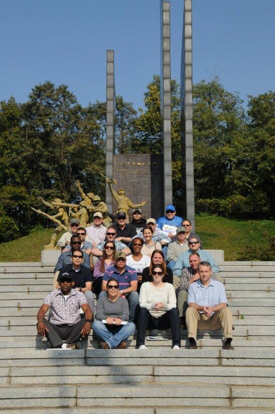 Soldiers from the Far East District gather together for a group photo during their visit to the grounds of the Battle of Osan and Suwon Fortress.
