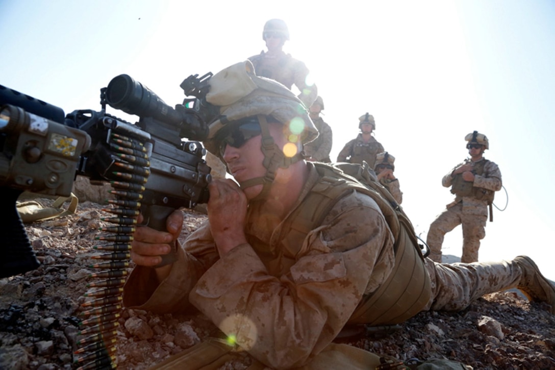 U.S. Marine Corps Lance Cpl. Noah Z. Allmon, a mortarman with Weapons Company, Battalion Landing Team 2nd Battalion, 1st Marines, 11th Marine Expeditionary Unit (MEU), and native of Rome, Georgia, fires an M249 squad automatic weapon (SAW) during a machine gunner live-fire refresher course as part of sustainment training at D’Arta Plage, Djibouti, Oct. 28. Marines from the 11th MEU are deployed with the Makin Island Amphibious Ready Group as a flexible, adaptable and persistent force in the U.S. 5th Fleet area of responsibility. (U.S. Marine Corps photos by Gunnery Sgt. Rome M. Lazarus/Released) 