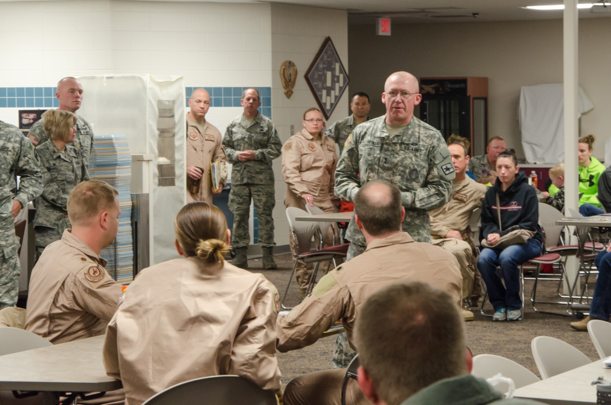 U.S. Army Maj. Gen. K. Luke Reiner addresses U.S. Air Force Airmen from the 153rd Airlift Wing, Wyoming Air National Guard.  Guard members representing operations, maintenance, medical and logistics deployed in support of the Overseas Contingency Operations in Southwest Asia. The Wyoming Air National Guard Airmen and aircraft are relieving members of the 130th Airlift Wing, Charleston West Virginia. (U.S. Air National Guard photo by Tech. Sgt. John Galvin/released)