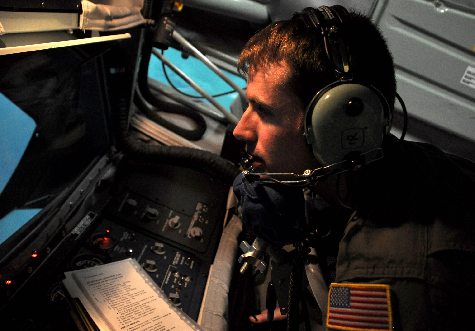 US Air Force Tech Sgt. Joel Hildebrand 63rd Air Refueling Squadron conducts an air-to-air refueling scenario on the boom operations weapon system trainer, November 1, 2014 at MacDill Air Force Base, Florida. The BOWST is used to enhance boom operators' skills and capabilities by simulating a refueling mission in a real world environment.(U.S. Air Force photo/Senior Airman Xavier Lockley)