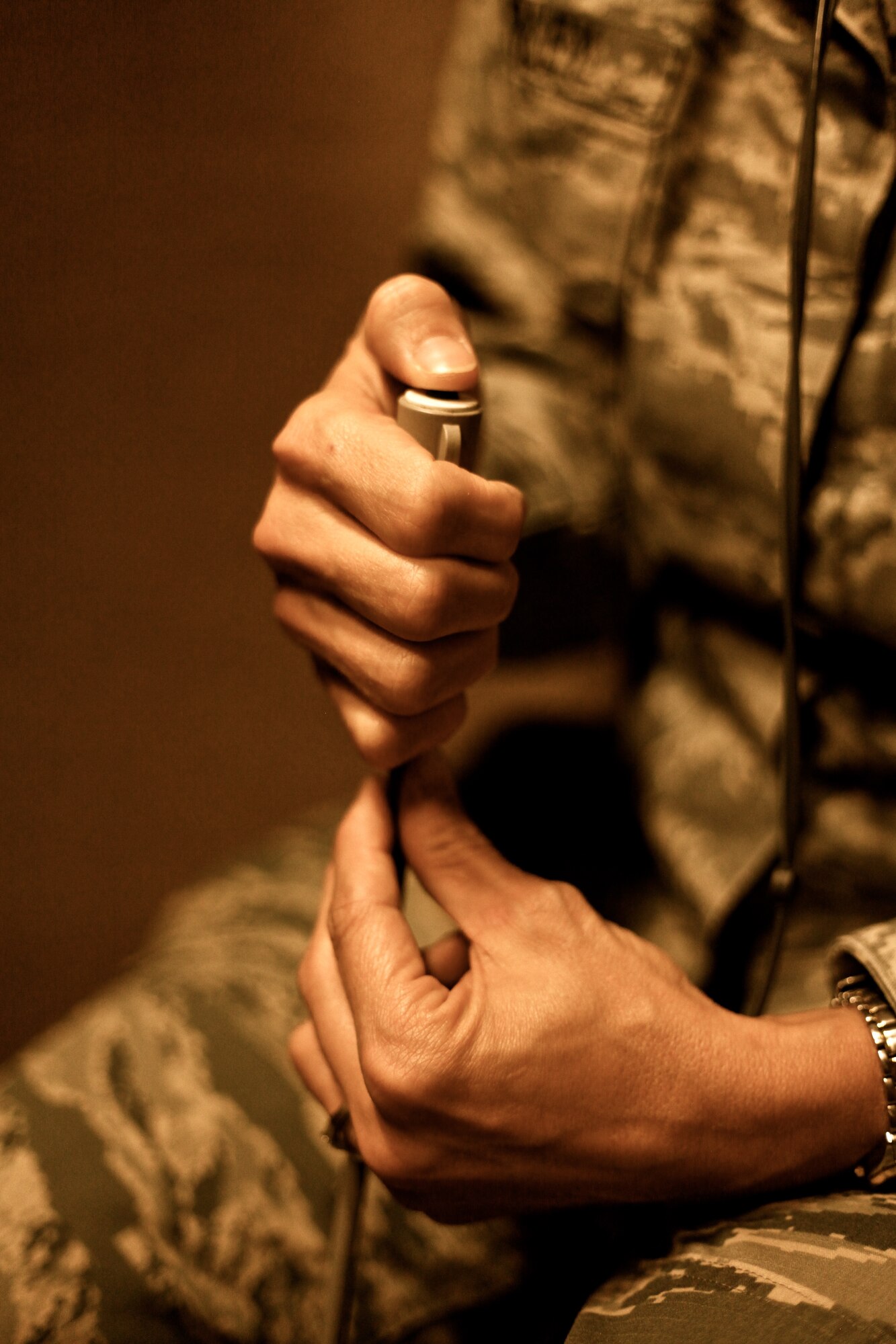 Maj. Nicole Hurley, the 315th Aerospace Medicine Squadron officer in charge of occupational health, waits patiently to press the response button during hearing test Saturday Nov. 1, 2014, in the hearing booth at the aerospace medicine office here at Joint Base Charleston, South Carolina. (U.S. Air Force photo by Staff Sgt. Rashard Coaxum)