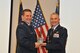 Col. James Muscatello of the 152d Air Operations Group presents Col. Richard D. Howard with the Minuteman Award in recognition of superior service and dedication at his retirement ceremony. Howard served 34 years of service and retired on Nov. 1, 2014 at the 174th Attack Wingin Syracuse, NY. (New York Air National Guard Photo Tech. Sgt. Justin A. Huett/Released)