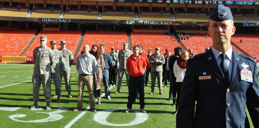 The newest members of the 442d Fighter Wing enlisted at Arrowhead Stadium in Kansas City, Mo. before the football game November 2, 2014. 