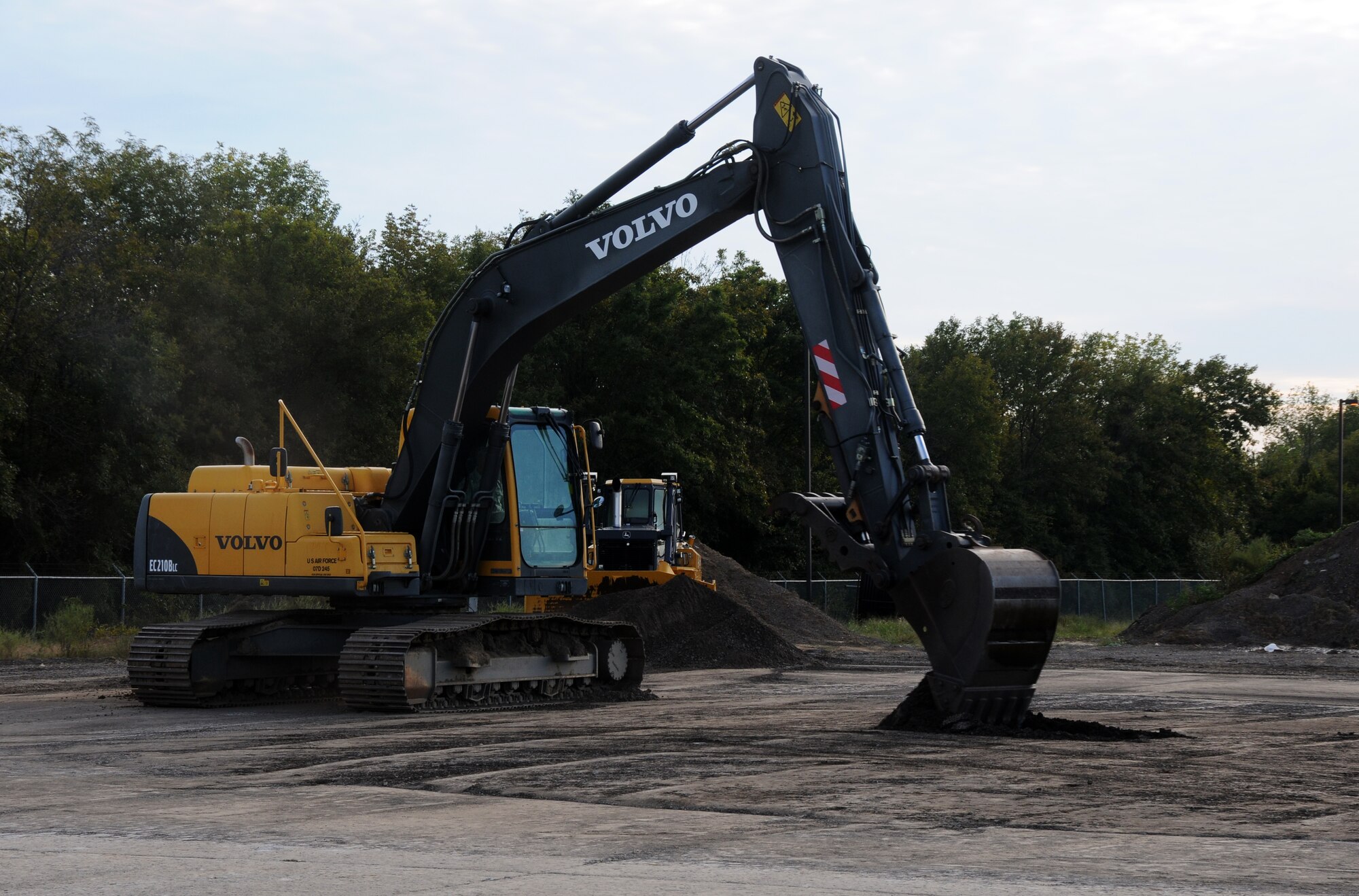 Tech. Sgt. Jeff Crowder, a member of the 188th Civil Engineering Squadron, operates a Volvo excavator at Ebbing Air National Guard Base, Fort Smith, Ark., Oct. 5, 2014. (U.S. Air National Guard photo by Airman 1st Class Cody Martin/Released)