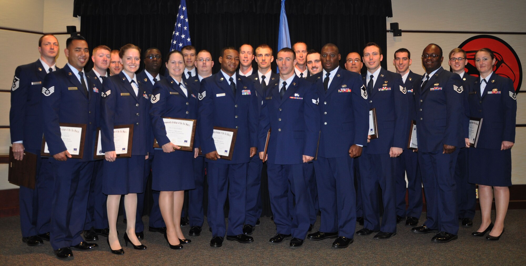 Thirty-three Airmen from the 931st Air Refueling Group received their diplomas during the organization's Community College of the Air Force graduation ceremony, McConnell Air Force Base, Kan., Nov. 2, 2014.  While 22 members were able to attend the event, 11 were unable due to deployments and military temporary duties.