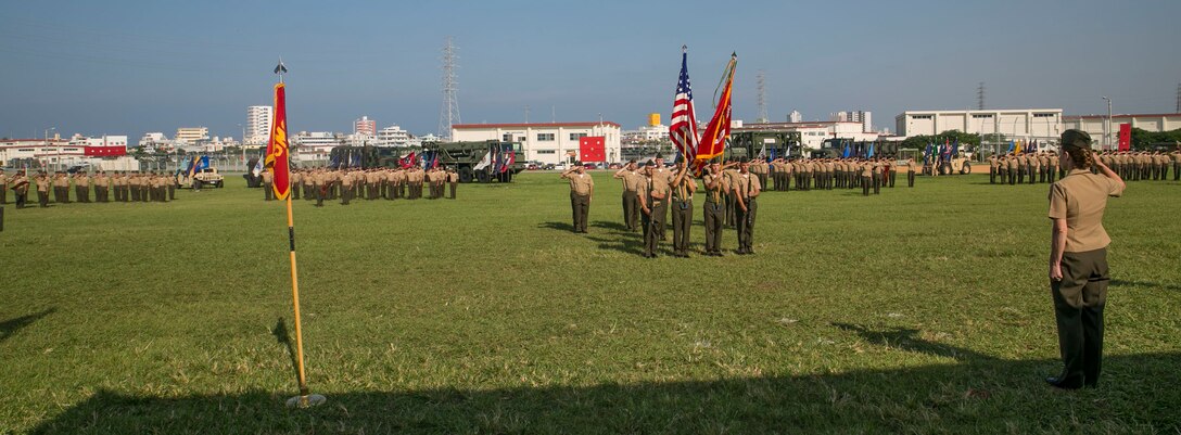 Lt. Col. Maria McMillen, from Craig, Colorado, salutes the battalion during the redesignation ceremony of 3rd Transportation Support Battalion Oct. 1 at the parade field on Camp Foster. The battalion is comprised of headquarters, motor transport, landing, and support companies. McMillen is the commanding officer for 3rd TSB, Combat Logistics Regiment 3, 3rd Marine Logistics Group, III Marine Expeditionary Force. 