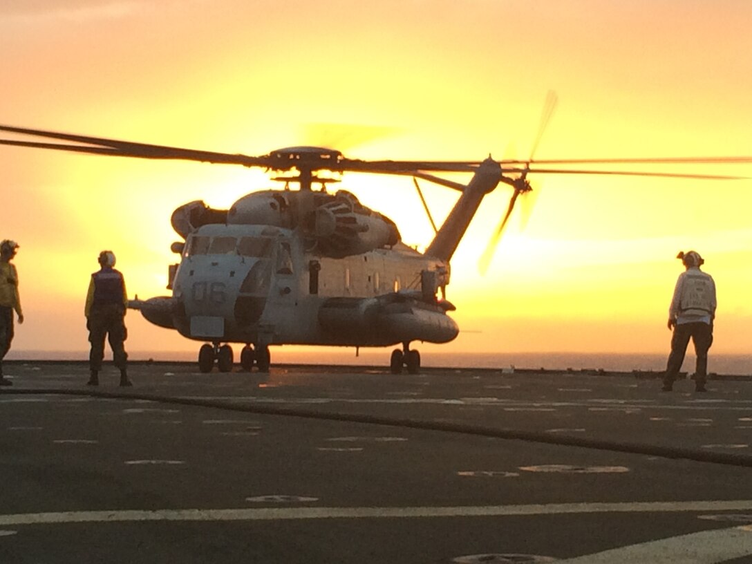 A CH-53E Super Stallion lands on the USS Germantown (LSD-42) October 31, in preparation for exercise Blue Chromite 2014. Blue Chromite, which is scheduled to officially begin Nov. 2, demonstrates the Navy and Marine Corps' amphibious and expeditionary capabilities from the sea. (US Marine Corps photo by Cpl. Wes Lucko/Released)