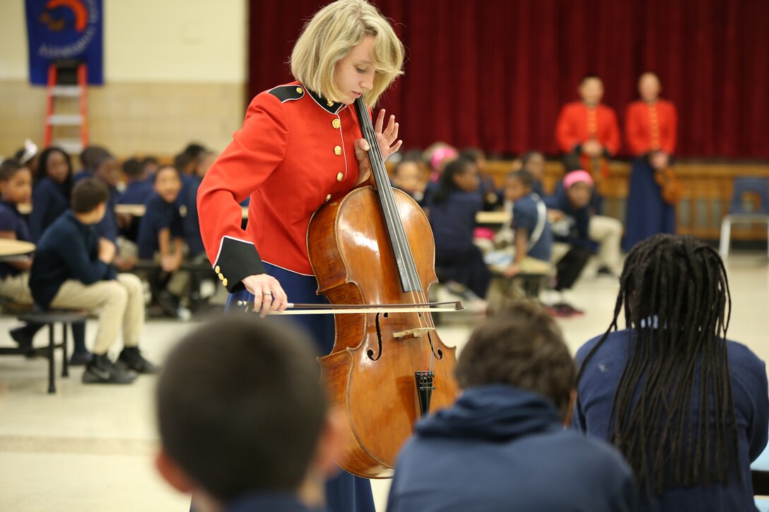 On Oct. 31, 2014, a string quartet from "The President's Own" including violinists Staff Sgts. Sheng-Tsung Wang and Chaerim Smith, violist Staff Sgt. Sarah Hart, and cellist Staff Sgt. Charlaine Prescott performed a Music in the Schools program at the John Hanson French Immersion School in Temple Hills, Md. (U.S. Marine Corps photo by Master Sgt. Kristin duBois/released)