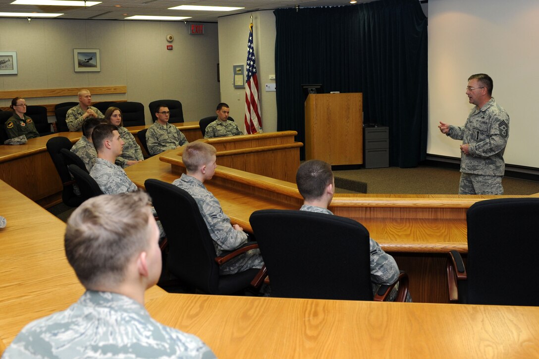 Chief Master Sgt. Kevin Peterson, 28th Bomb Wing command chief, speaks to Airmen during a Single Airman Initiative focus group at Ellsworth Air Force Base, S.D., Oct. 29, 2014. The interactive forum allowed Airmen to discuss events and programs for single Airmen they would like to see offered by the 28th Force Support Squadron. (U.S. Air Force photo by Senior Airman Hailey R. Staker/Released)