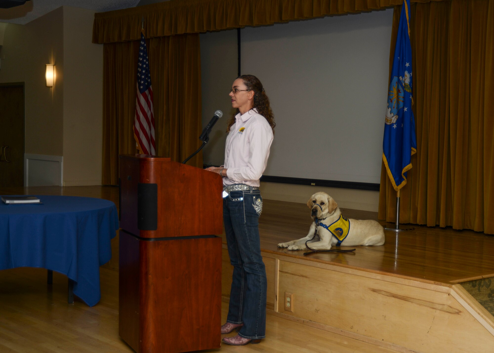 Melissa Billingsley, a volunteer puppy raiser with K-9 Companions for Independence attended the luncheon with four service dogs in training and spoke about what it takes to raise a service dog. The Disability Rights Employment Awareness Month luncheon was the capstone event for the month, which featured several events to bring awareness to workers with disabilities. (U.S. Air Force photo by Rebecca Amber) 