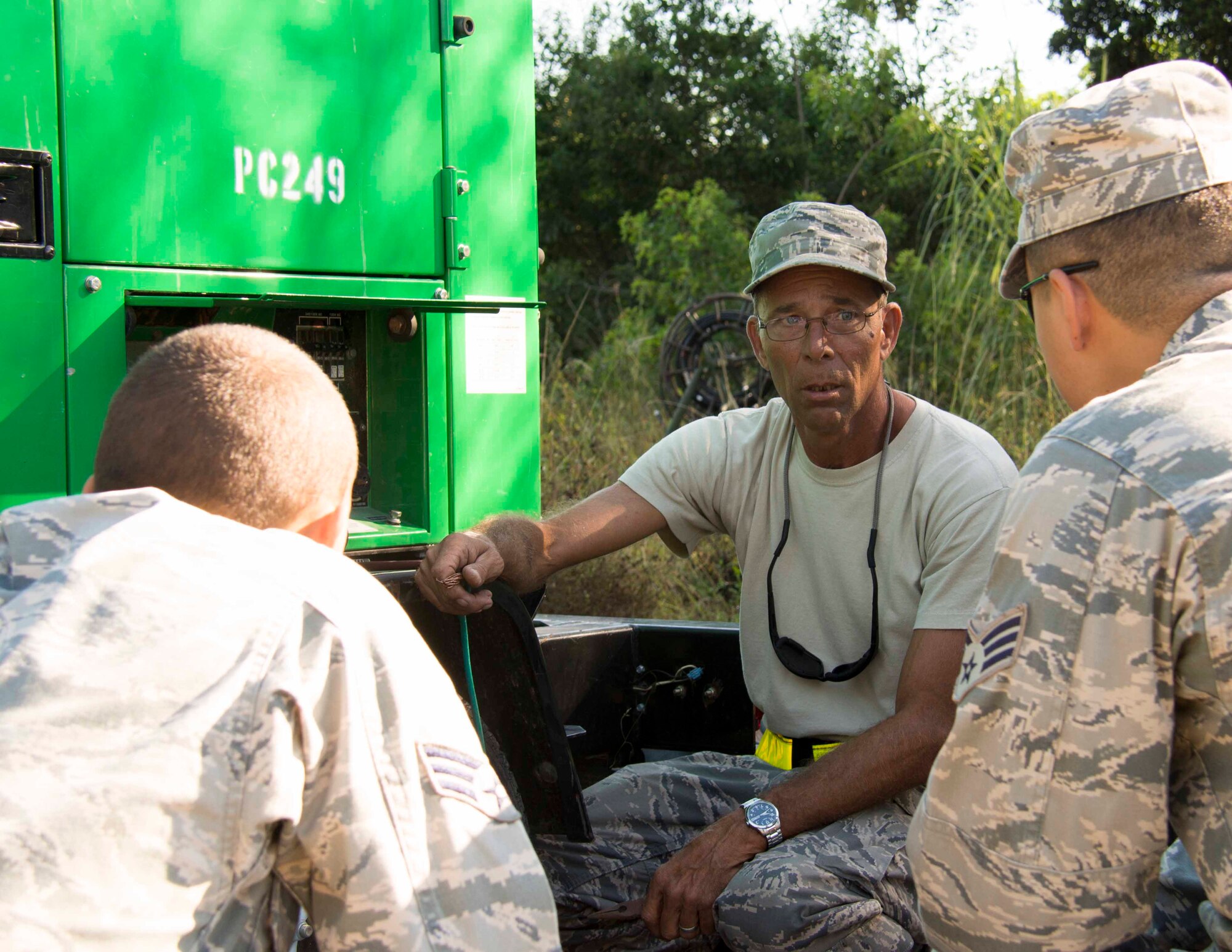 Tech. Sgt. Donald M. Meiners, a member of the 482nd Civil Engineering Squadron at Homestead Air Reserve Base, Fla., teaches a group of Airman about the generator included in their Joint Incident Site Communications Capability kit during a base recovery exercise here Oct. 18.  The exercise was the first of its kind and included four additional Air Force Reserve units from across the nation. (U.S. Air Force photo/Senior Airman Jaimi L. Upthegrove)