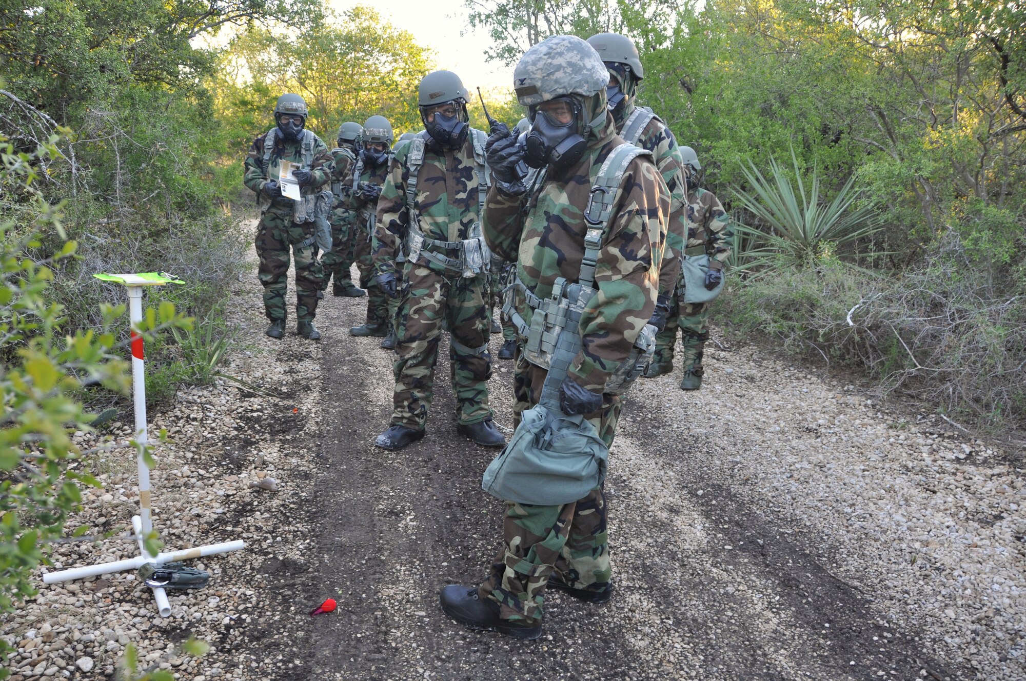 Col. William W. Whittenberger, Jr., 433rd Airlift Wing commander, radio ins his groups' observation at one of the eight stations during Operation Ice Breaker at Camp Bramble on Joint Base San Antonio-Lackland, Texas on Nov. 1, 2014. 