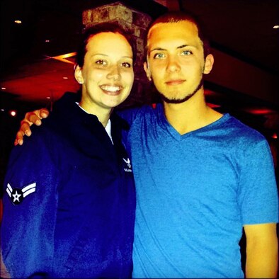 Airman 1st Class Jessica Smith and her brother, Zach Watson, pose for a picture in San Antonio, Texas, Jan. 31, 2014. After completing basic training, Smith's family visited to celebrate the graduation. (Courtesy photo)
