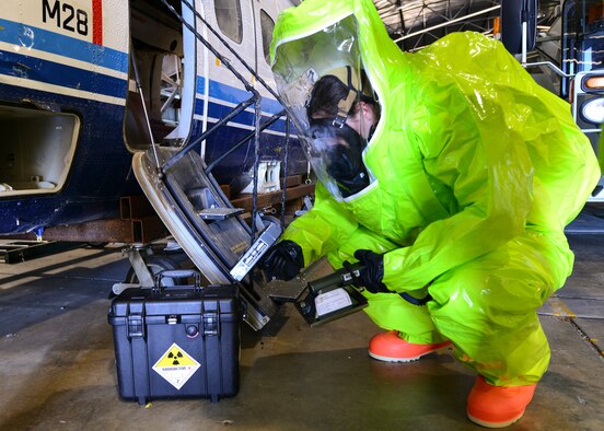 Senior Airman Erika Lis, 919th Special Operations Civil Engineer Squadron’s emergency management office, checks for radiation during a training exercise Nov. 1 at Duke Field, Fla. The exercise tested the interoperability of fire and emergency management Airmen during a response to an aircraft fire/HazMat emergency scenario. (U.S. Air Force photo/ Tech. Sgt. Cheryl L. Foster)