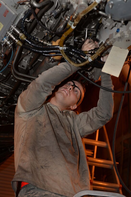 Airman 1st Class Ian Seay, 28th Maintenance Squadron engine test cell technician, performs maintenance on the engine test cell at Ellsworth Air Force Base, S.D., Sept. 12, 2014. The goal of the test cell is to increase mission effectiveness by troubleshooting engine problems locally. (U.S. Air Force photo by Airman 1st Class Rebecca Imwalle/ Released) 