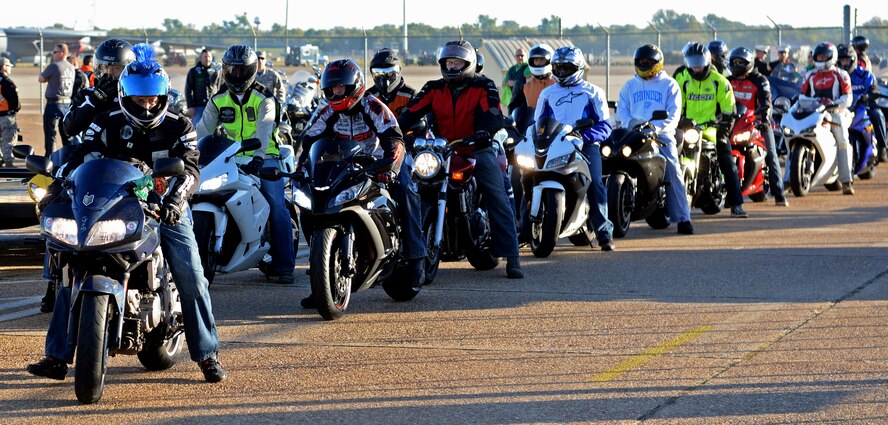 Motorcyclists prepare to depart for the third Annual Cajun Rumble mentorship ride on Barksdale Air Force Base, La., Oct. 31, 2014. The theme of this year's annual event was "look twice, save a life." (U.S. Air Force photo/Airman 1st Class Curt Beach)