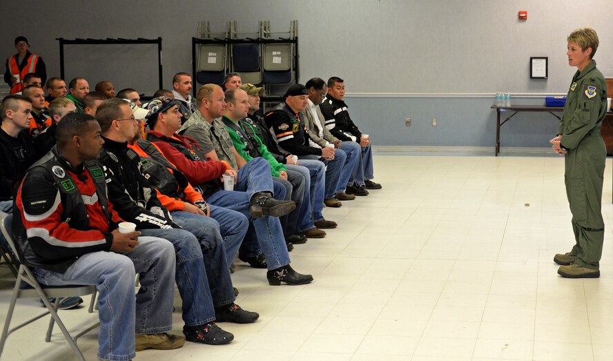 Col. Kristin Goodwin, 2nd Bomb Wing commander, gives the opening remarks to Barksdale motorcyclists to kick off Cajun Rumble on Barksdale Air Force Base, La., Oct. 31, 2014. The first chapter of the Green Knights was formed in 1999, and today there are more than 105 chapters worldwide. (U.S. Air Force photo/Airman 1st Class Curt Beach)