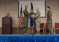 Lt. Col. Charles Needham, the new 419th Medical Squadron commander, accepts the squadron flag from Col. Bryan Radliff, 419th Fighter Wing commander, during a change of command ceremony here Nov. 2. Needham is taking over for Col. Laurence Nelson after three years. (U.S. Air Force photo/Staff Sgt. Crystal Charriere)
