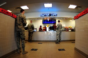 U.S. Air Force Airmen grab lunch at the Raptor Cafe at Langley Air Force Base, Va., Oct. 30, 2014. The Raptor Cafe aims to make it easier for workers and maintainers from the flight line and pilots to get a hot meal or something quick on the go. (U.S. Air Force photo by Airman 1st Class Areca T. Wilson/Released) 