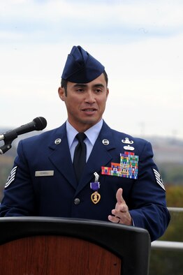 Tech. Sgt. Christopher Ferrell provides comments after being presented with a Purple Heart Medal during a ceremony at the Air Force Memorial in Arlington, Va., Oct. 31, 2014. Ferrell is an explosive ordnance disposal technician assigned to the 11th Civil Engineer Squadron at Joint Base Andrews, Md. (U.S. Air Force photo/Master Sgt. Tammie Moore)