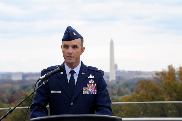 Maj. Mark Fogle provides comments during a Purple Heart Medal presentation ceremony for Tech. Sgt. Christopher Ferrell at the Air Force Memorial in Arlington, Va., Oct. 31, 2014. Fogle is the 366th Training Squadron/Detachment 3 commander at Eglin Air Force Base, Fla. Ferrell is an explosive ordnance disposal technician assigned to the 11th Civil Engineer Squadron at Joint Base Andrews, Md. (U.S. Air Force photo/Master Sgt. Tammie Moore) 