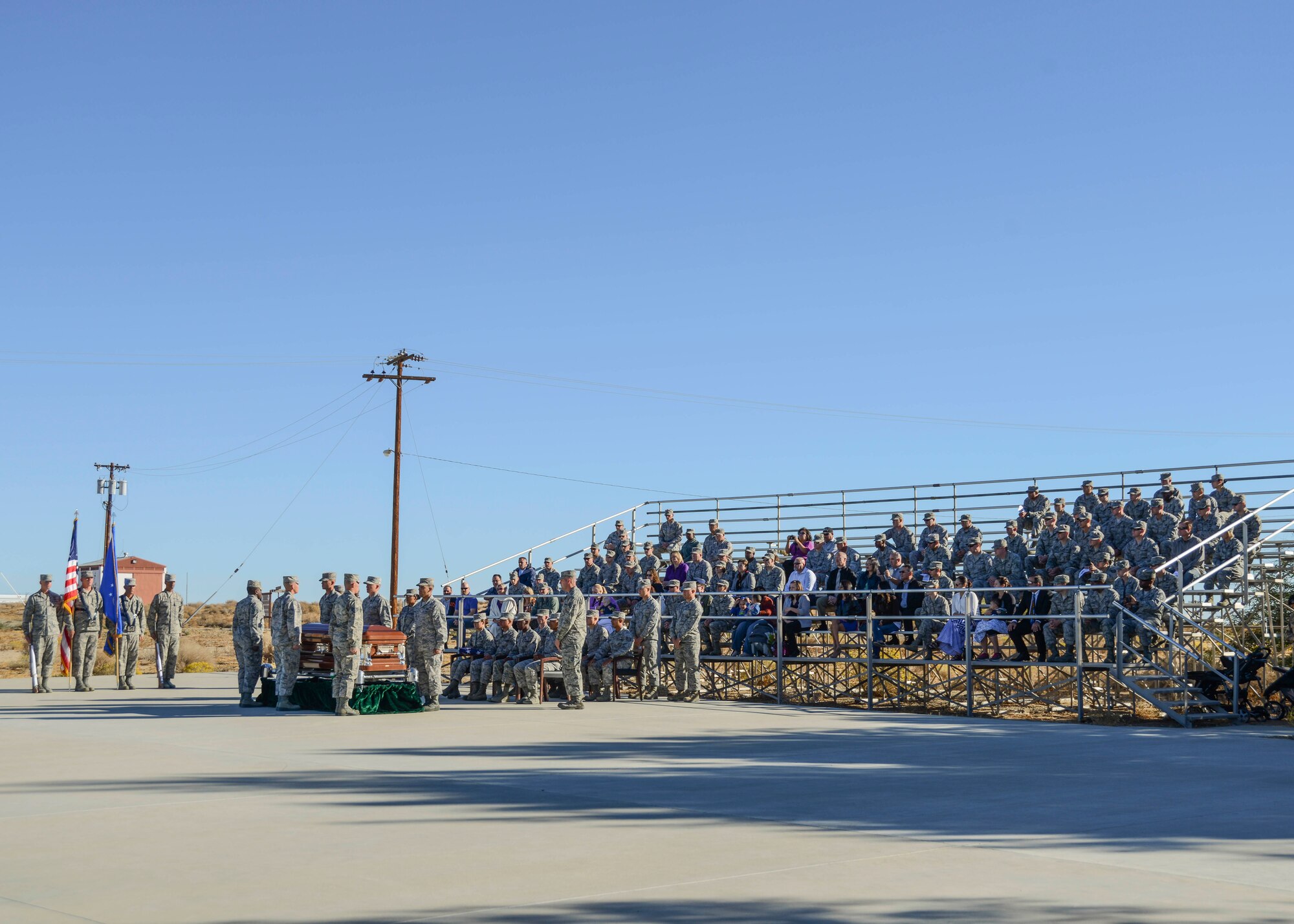 Team Edwards observes the graduation ceremony for new members of the Blue Eagles Honor Guard Oct. 29, at the Airman Leadership School drill pad. Instructors from the United States Air Force Honor Guard from Bolling AFB, Maryland,  traveled to Edwards and provided training in an intense, week-long course. (U.S. Air Force photo by Rebecca Amber)

