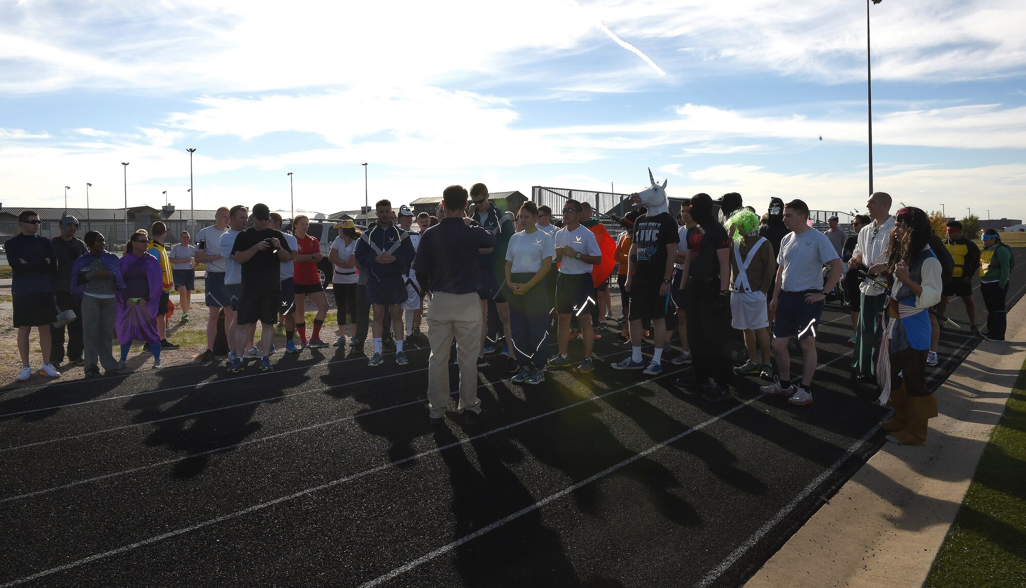 Team Buckley members prepare to run the Dreadful Dash Oct. 31, 2014, on Buckley Air Force Base, Colo. Runners dressed up as their favorite characters, critters and creatures and ran a 5K around the base. (U.S. Air Force photo by Airman 1st Class Samantha Saulsbury/Released)