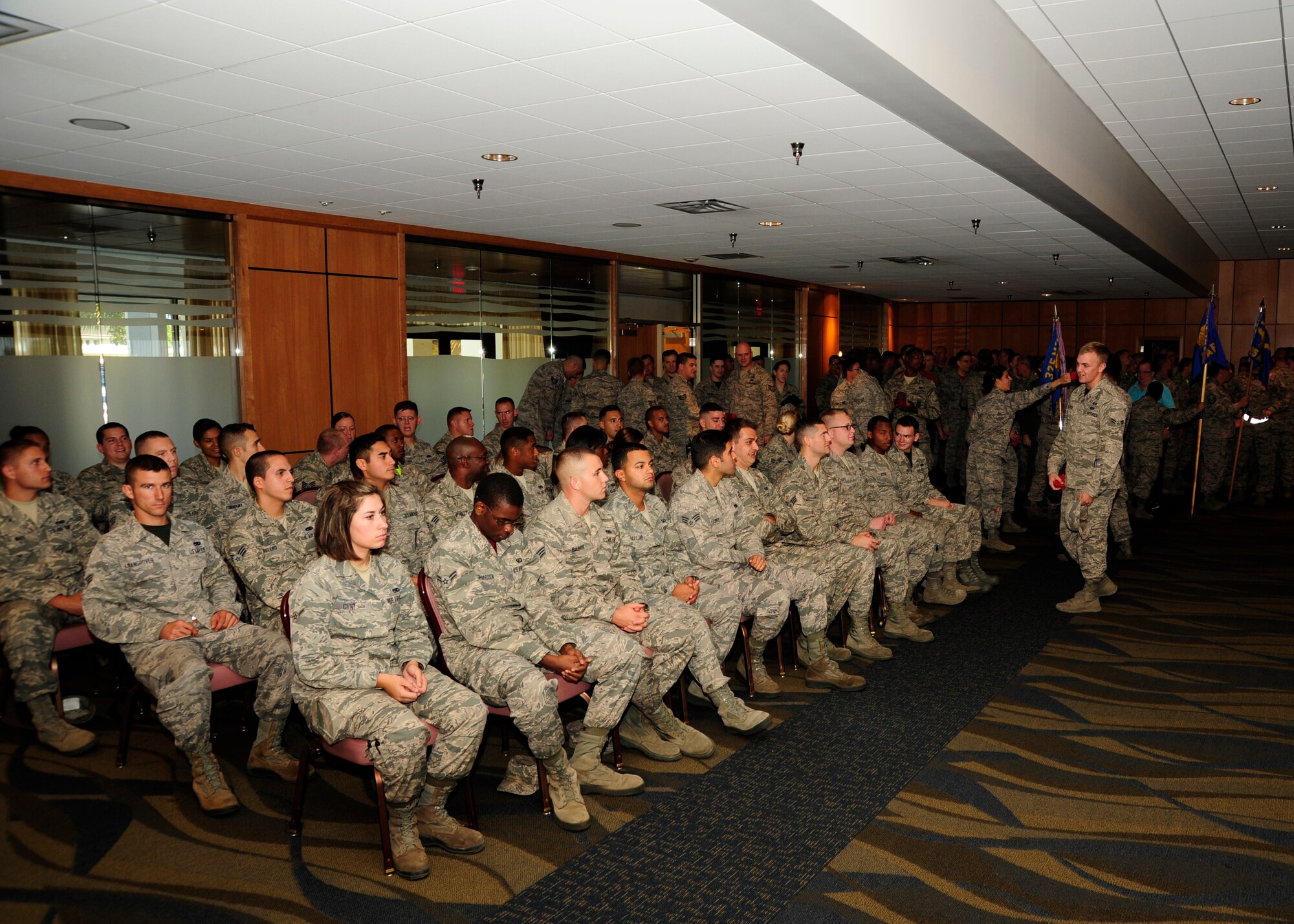 Tyndall’s newest promotees wait to walk across the stage during the November Promotion Ceremony Oct. 31 at the Horizon’s Ballroom. The monthly promotion ceremony honors those Airmen receiving a new rank. (U.S. Air Force photo by Airman 1st Class Solomon Cook) 