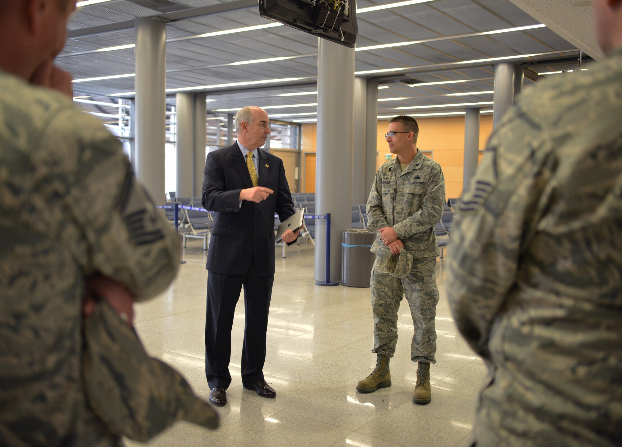 Dr. J.D. Crouch, USO’s president and CEO, takes a tour of the Ramstein Passenger Terminal on Ramstein Air Base, Germany, Oct. 28, 2014. Crouch and his wife came to Ramstein to visit different USOs in the region. (U.S. Air Force photo/Senior Airman Hailey Haux)