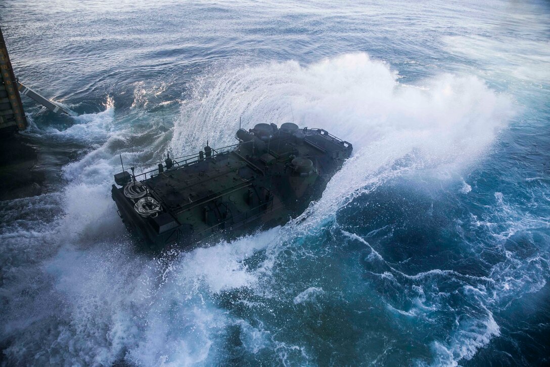 Marines launch their Assault Amphibious Vehicle from the hull of the USS Germantown (LSD 42) Nov. 2 during exercise Blue Chromite 15. Blue Chromite demonstrates the Navy and Marine Corps’ amphibious and expeditionary capabilities from the sea. The Marines are with Combat Assault Battalion, 3rd Marine Division, III Marine Expeditionary Force.