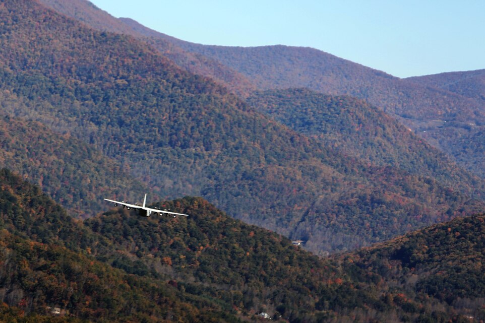 A KC-130J Super Hercules glides over a mountain top during tactical navigation training near Hunter Army Airfield, Ga., Oct. 23, 2014. The aircraft belongs to Marine Aerial Refueler Transport Squadron 252 which conducted the training to improve its naval aviators’ skills. Tactical navigation training allows pilots to hone skills through disparate terrain to avoid ground threats.