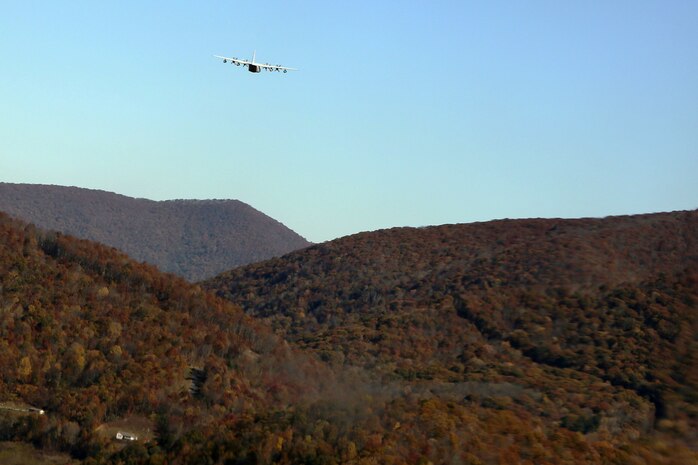 A KC-130J Super Hercules glides over a mountain top during tactical navigation training near Hunter Army Airfield, Ga., Oct. 23, 2014. The aircraft belongs to Marine Aerial Refueler Transport Squadron 252 which conducted the training to improve its naval aviators’ skills. Tactical navigation training allows pilots to hone skills through disparate terrain to avoid ground threats.
